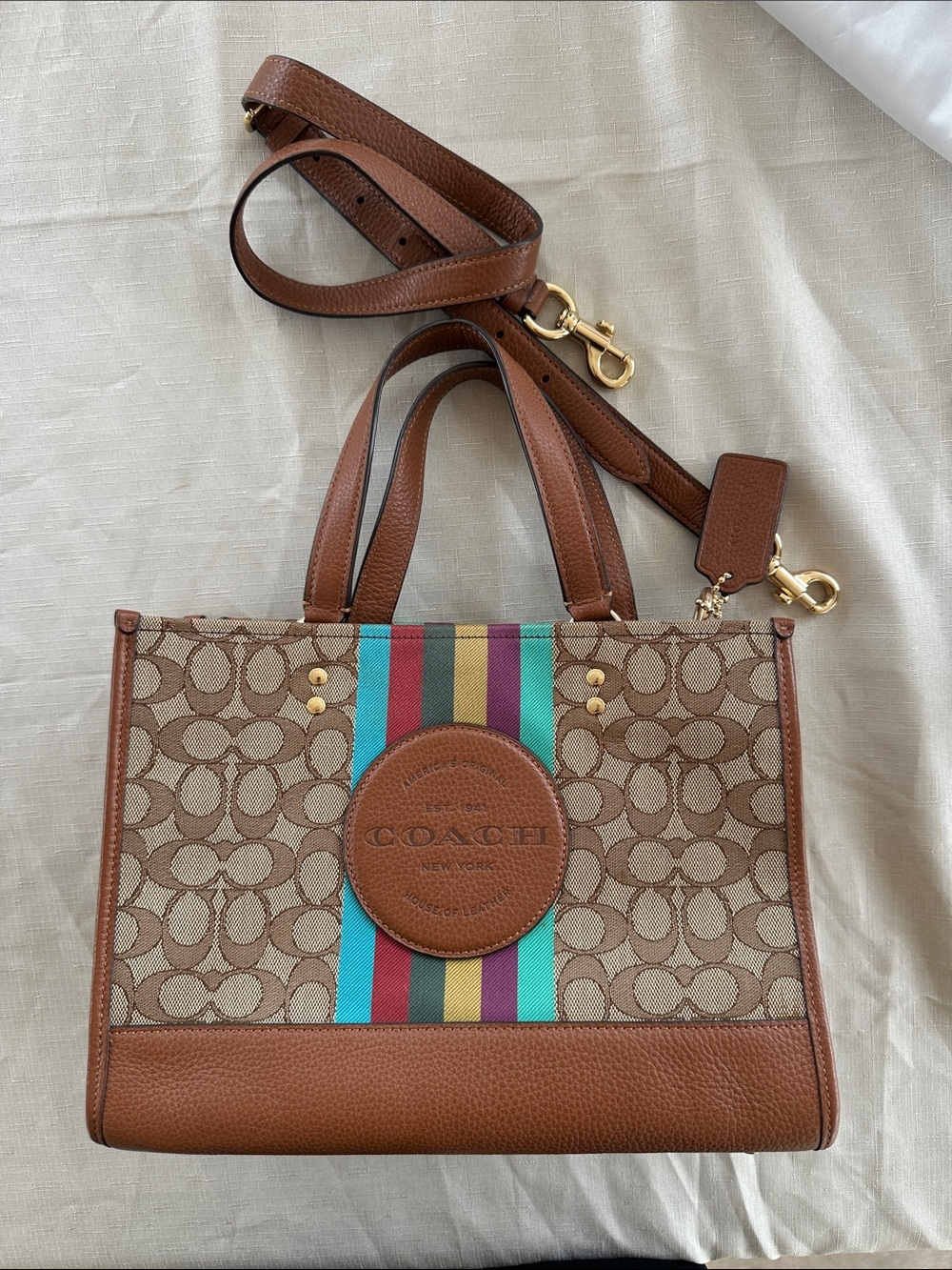 Coach Dempsey tote 22 with brown leather trim
